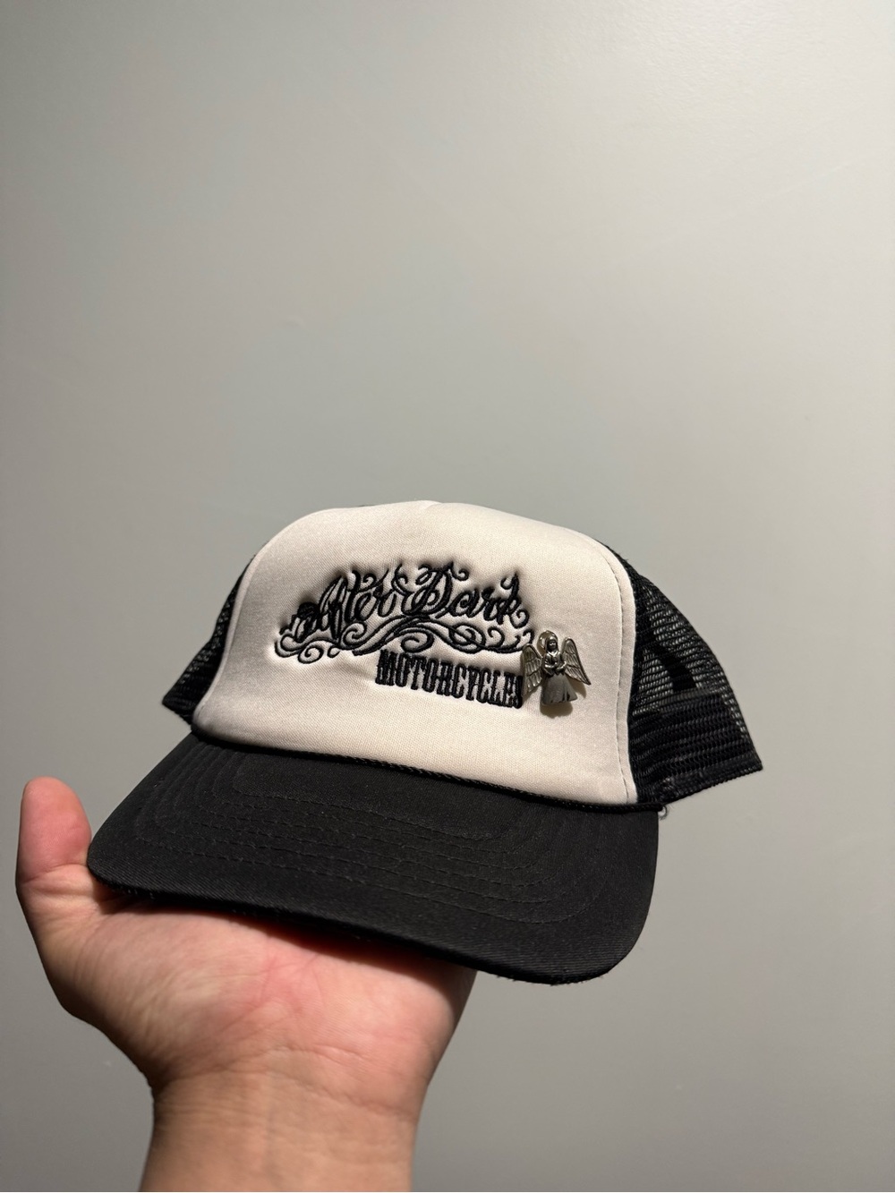 Vintage After Dark Trucker Hat with a pin